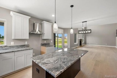 This turn-key, move-in ready home comes complete with sod and on Bello Woods Golf Club in Michigan - for sale on GolfHomes.com, golf home, golf lot