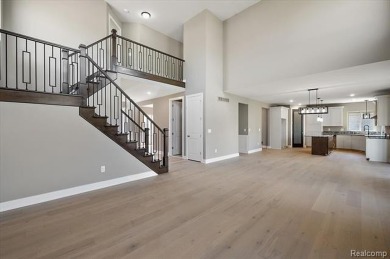 This turn-key, move-in ready home comes complete with sod and on Bello Woods Golf Club in Michigan - for sale on GolfHomes.com, golf home, golf lot