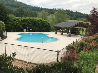 Located in Mountain Harbour, a Premier Golf Club Community on Chatuge Shores Golf Course in North Carolina - for sale on GolfHomes.com, golf home, golf lot