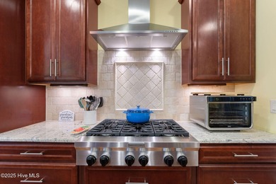 This exceptional residence, located within the esteemed Compass on Compass Pointe Golf Course in North Carolina - for sale on GolfHomes.com, golf home, golf lot