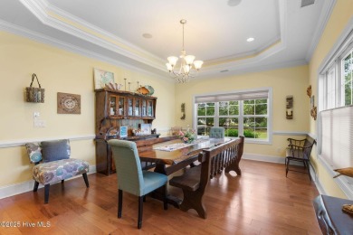This exceptional residence, located within the esteemed Compass on Compass Pointe Golf Course in North Carolina - for sale on GolfHomes.com, golf home, golf lot