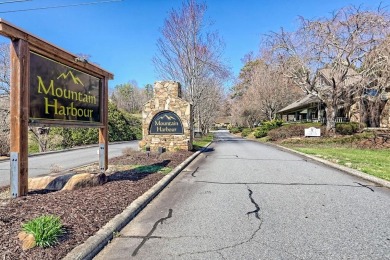 Located in Mountain Harbour, a Premier Golf Club Community on Chatuge Shores Golf Course in North Carolina - for sale on GolfHomes.com, golf home, golf lot