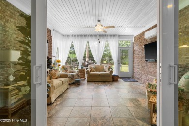This exceptional residence, located within the esteemed Compass on Compass Pointe Golf Course in North Carolina - for sale on GolfHomes.com, golf home, golf lot