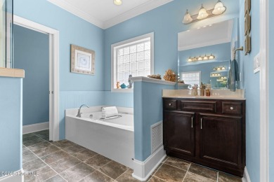 This exceptional residence, located within the esteemed Compass on Compass Pointe Golf Course in North Carolina - for sale on GolfHomes.com, golf home, golf lot