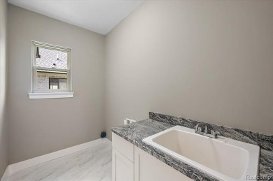 This turn-key, move-in ready home comes complete with sod and on Bello Woods Golf Club in Michigan - for sale on GolfHomes.com, golf home, golf lot