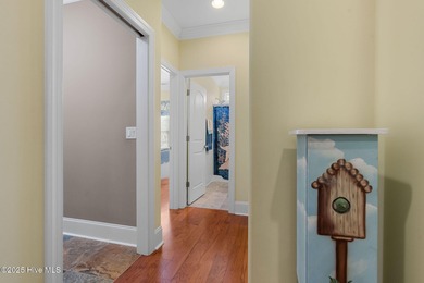 This exceptional residence, located within the esteemed Compass on Compass Pointe Golf Course in North Carolina - for sale on GolfHomes.com, golf home, golf lot