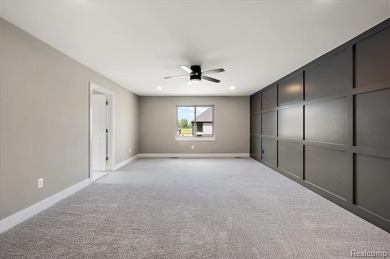 This turn-key, move-in ready home comes complete with sod and on Bello Woods Golf Club in Michigan - for sale on GolfHomes.com, golf home, golf lot