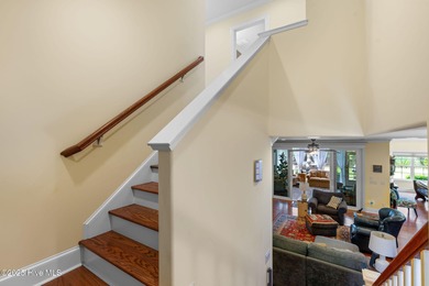 This exceptional residence, located within the esteemed Compass on Compass Pointe Golf Course in North Carolina - for sale on GolfHomes.com, golf home, golf lot