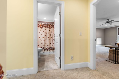 This exceptional residence, located within the esteemed Compass on Compass Pointe Golf Course in North Carolina - for sale on GolfHomes.com, golf home, golf lot