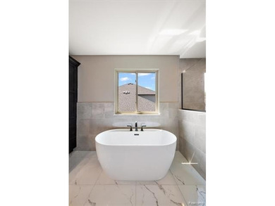 Price Improvement! Located in the desirable new Mistwood on Bello Woods Golf Club in Michigan - for sale on GolfHomes.com, golf home, golf lot