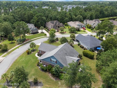 This exceptional residence, located within the esteemed Compass on Compass Pointe Golf Course in North Carolina - for sale on GolfHomes.com, golf home, golf lot