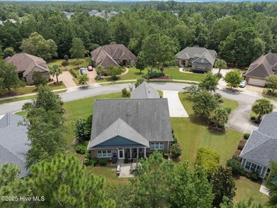 This exceptional residence, located within the esteemed Compass on Compass Pointe Golf Course in North Carolina - for sale on GolfHomes.com, golf home, golf lot