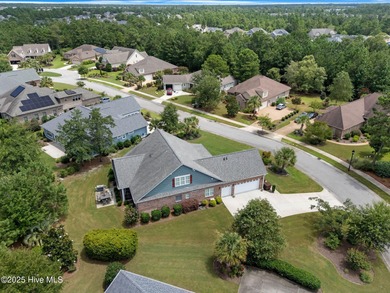 This exceptional residence, located within the esteemed Compass on Compass Pointe Golf Course in North Carolina - for sale on GolfHomes.com, golf home, golf lot