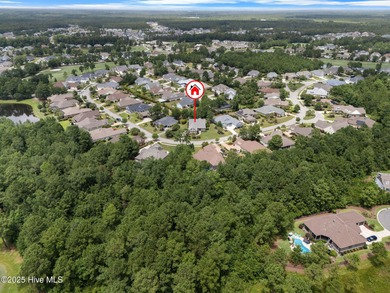 This exceptional residence, located within the esteemed Compass on Compass Pointe Golf Course in North Carolina - for sale on GolfHomes.com, golf home, golf lot