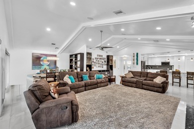 Beautifully renovated one story home featuring a modern open on Boca Greens Country Club in Florida - for sale on GolfHomes.com, golf home, golf lot