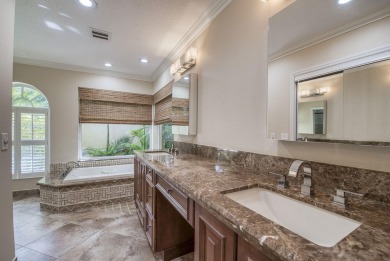 Discover the perfect blend of comfort, style, and convenience in on PGA National Golf Club in Florida - for sale on GolfHomes.com, golf home, golf lot