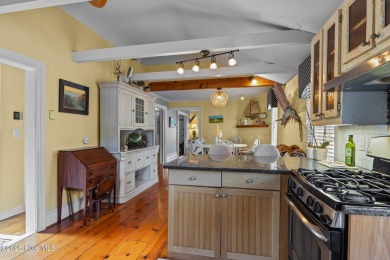 This historic home, long known as the ''Conch House,'' sits on North River Club in North Carolina - for sale on GolfHomes.com, golf home, golf lot
