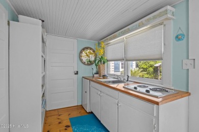 This historic home, long known as the ''Conch House,'' sits on North River Club in North Carolina - for sale on GolfHomes.com, golf home, golf lot