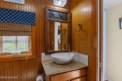 This historic home, long known as the ''Conch House,'' sits on North River Club in North Carolina - for sale on GolfHomes.com, golf home, golf lot