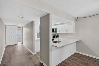 Discover carefree living in the vibrant 55+ community of Green on Tarpon Springs Golf Course in Florida - for sale on GolfHomes.com, golf home, golf lot