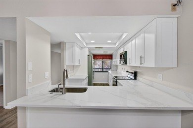 Discover carefree living in the vibrant 55+ community of Green on Tarpon Springs Golf Course in Florida - for sale on GolfHomes.com, golf home, golf lot