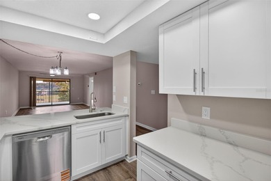 Discover carefree living in the vibrant 55+ community of Green on Tarpon Springs Golf Course in Florida - for sale on GolfHomes.com, golf home, golf lot