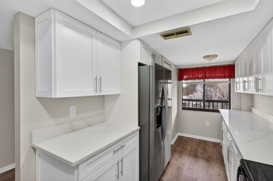 Discover carefree living in the vibrant 55+ community of Green on Tarpon Springs Golf Course in Florida - for sale on GolfHomes.com, golf home, golf lot