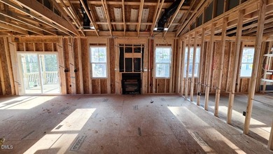 Custom-Built True Ranch by Ken Harvey Homes in Lake Royale-a on River Golf and Country Club at Lake Royale in North Carolina - for sale on GolfHomes.com, golf home, golf lot