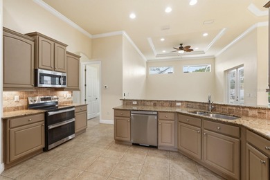 One or more photo(s) has been virtually staged. Short Sale on The Grand Club Cypress Course in Florida - for sale on GolfHomes.com, golf home, golf lot