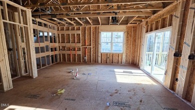 Custom-Built True Ranch by Ken Harvey Homes in Lake Royale-a on River Golf and Country Club at Lake Royale in North Carolina - for sale on GolfHomes.com, golf home, golf lot