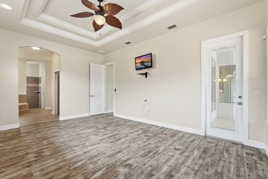 One or more photo(s) has been virtually staged. Short Sale on The Grand Club Cypress Course in Florida - for sale on GolfHomes.com, golf home, golf lot