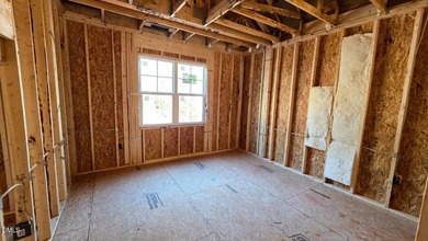 Custom-Built True Ranch by Ken Harvey Homes in Lake Royale-a on River Golf and Country Club at Lake Royale in North Carolina - for sale on GolfHomes.com, golf home, golf lot