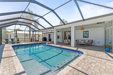 NEWER GULF ACCESS WATERFRONT HOME WITH INSPIRED COASTAL DESIGN on Apollo Beach Golf and Sea Club in Florida - for sale on GolfHomes.com, golf home, golf lot