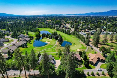 Discover unparalleled elegance and breathtaking views in this on Hayden Lake Country Club in Idaho - for sale on GolfHomes.com, golf home, golf lot