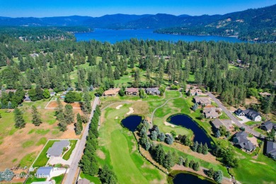 Discover unparalleled elegance and breathtaking views in this on Hayden Lake Country Club in Idaho - for sale on GolfHomes.com, golf home, golf lot