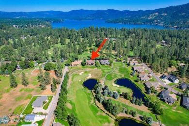 Discover unparalleled elegance and breathtaking views in this on Hayden Lake Country Club in Idaho - for sale on GolfHomes.com, golf home, golf lot