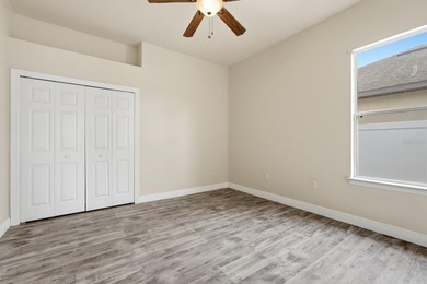 One or more photo(s) has been virtually staged. Short Sale on The Grand Club Cypress Course in Florida - for sale on GolfHomes.com, golf home, golf lot