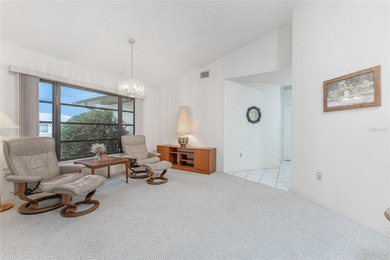 Beautifully maintained 1,732 sq ft, 3-bedroom, 2-bath pool home on Rotonda Golf and Country Club The Palms Course in Florida - for sale on GolfHomes.com, golf home, golf lot