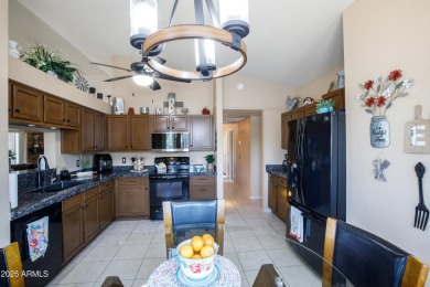 Beautiful, warm and welcoming Granada sits on a larger corner on SunBird Golf Club in Arizona - for sale on GolfHomes.com, golf home, golf lot