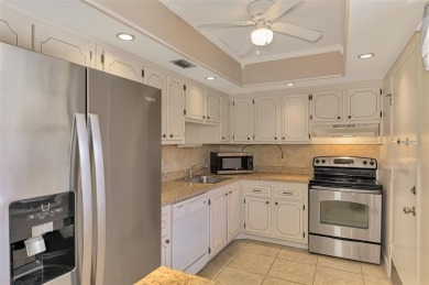 Ideal and affordable Florida winter home in Rotonda West on Rotonda Golf and Country Club The Hills Course in Florida - for sale on GolfHomes.com, golf home, golf lot