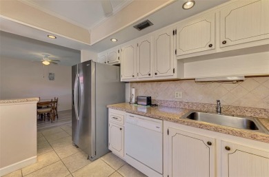 Ideal and affordable Florida winter home in Rotonda West on Rotonda Golf and Country Club The Hills Course in Florida - for sale on GolfHomes.com, golf home, golf lot