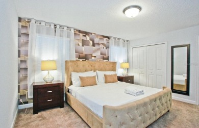Fully furnished and decorated 4BR/3BA pool home in the on The Oasis Club at Champions Gate in Florida - for sale on GolfHomes.com, golf home, golf lot