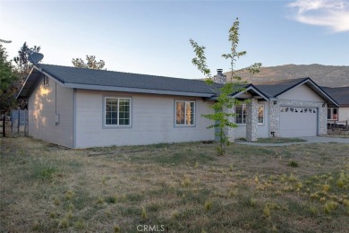 This single-level home is located a few streets from the Oak on Oak Tree Country Club in California - for sale on GolfHomes.com, golf home, golf lot