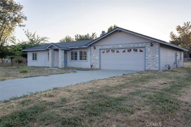 This single-level home is located a few streets from the Oak on Oak Tree Country Club in California - for sale on GolfHomes.com, golf home, golf lot