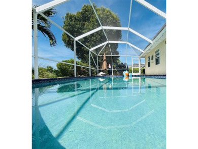 Welcome to this Florida gem in the heart of Country Club Estates on St. Lucie Trail Golf Club in Florida - for sale on GolfHomes.com, golf home, golf lot