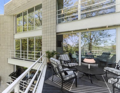 Circular drive leads to this contemporary masterpiece of on Country Club Estates Golf Course in Wisconsin - for sale on GolfHomes.com, golf home, golf lot