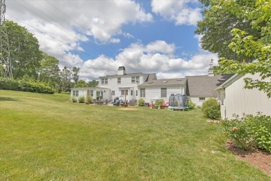 ALWAYS ADMIRED, EXQUISITE cape style home located at the foot of on Shuttle Meadow Country Club in Connecticut - for sale on GolfHomes.com, golf home, golf lot