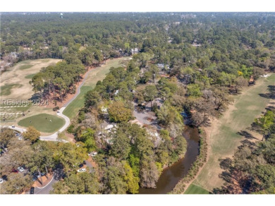Embrace Sea Pines Resort living with this 3-bed, 3-bath retreat on  in South Carolina - for sale on GolfHomes.com, golf home, golf lot