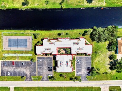 Ideal and affordable Florida winter home in Rotonda West on Rotonda Golf and Country Club The Hills Course in Florida - for sale on GolfHomes.com, golf home, golf lot
