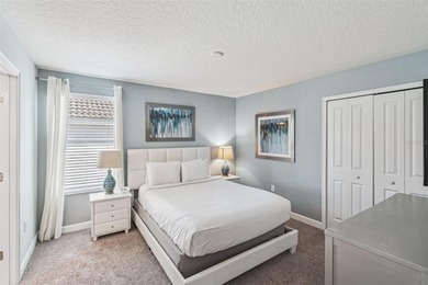 Experience the ultimate Florida lifestyle at 9046 Stinger Dr, a on The Oasis Club at Champions Gate in Florida - for sale on GolfHomes.com, golf home, golf lot